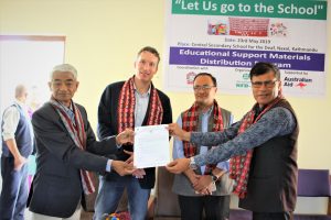 Photo: In Presence of Mr. Peter Budd, honorable ambassador, embassy of Australia, the formal letter of handover of support materils to the President of SMC, Mr. Narayan Bhakta Shrestha (Rayan) by NFDN President Mr. Mitralal Sharma